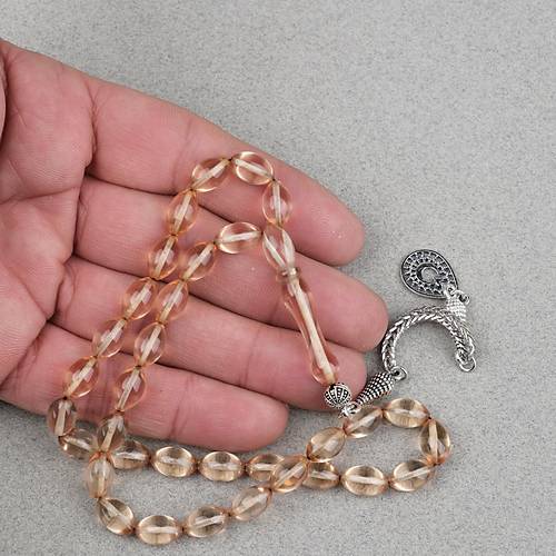 Ate� Kehribar Alpaka P�sk�ll� Beyzi Kesim 7x11mm Tesbih- A��k Sar�