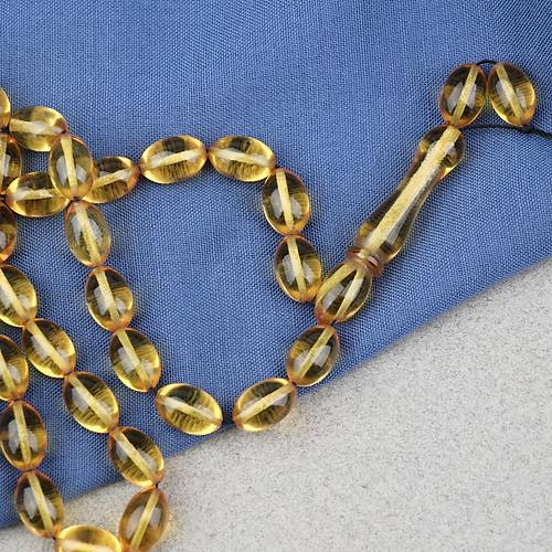 Ate� Kehribar Beyzi Kesim 7x11mm Tesbih- �effaf Sar�