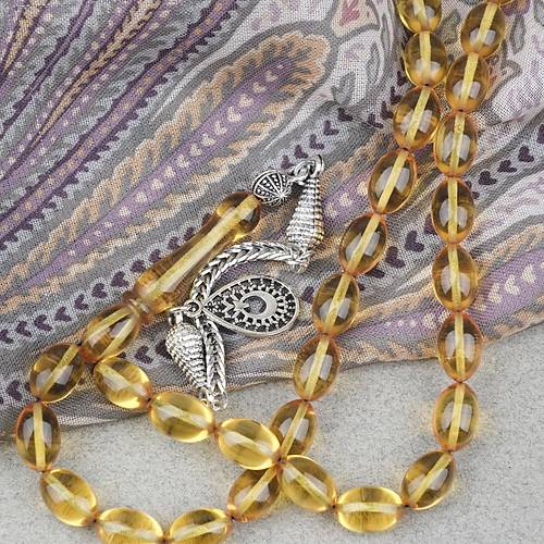 Ate� Kehribar Alpaka P�sk�ll� Beyzi Kesim 7x11mm Tesbih- �effaf Sar�