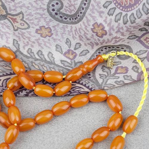 Omari S�kma Kehribar Beyzi Kesim Sistemli 7.5x12mm Tesbih