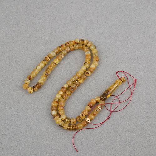 Damla Kehribar 99luk Tekerlek Kesim 6.5x5.5mm Namez Tesbihi