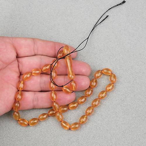 S�kma Kehribar Beyzi Kesim 7x11mm Tesbih- �effaf Koyu Sar�