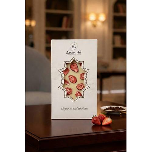 Beyaz �ilek par�ac�kl� bel�ika �ikolatas� tablet 100g e