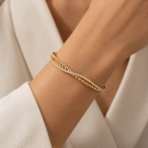 Dorika Wave Gold Bangle