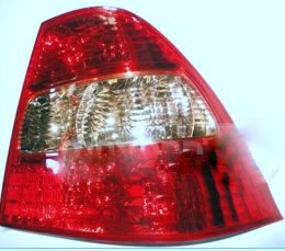 TOYOTA COROLLA ZZE121 STOP LAMBASI SOL KIRMIZI/ŞEFFAF SARI  2002-2003